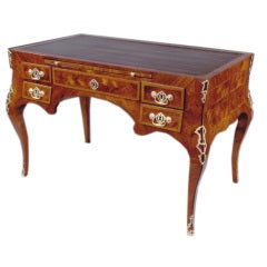 Antique A kingwood, tulipwood, and pine writing table