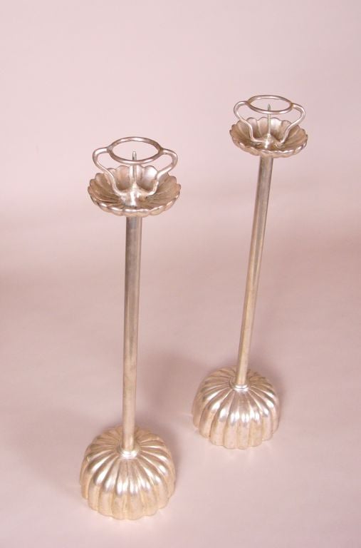 Pair of modern Japanese silvered bronze candlesticks.  Chrysanthemum, or kiku, shaped base. 