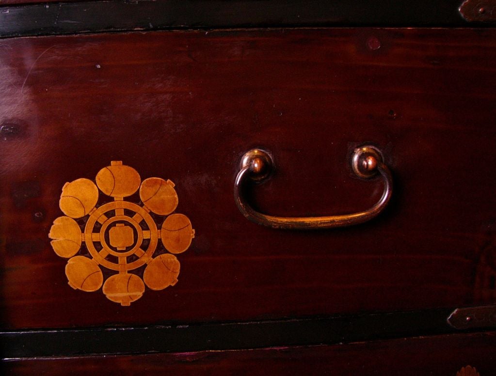 Japanese Black Lacquer Tansu Chest with Gold Leaf and Mon Design.