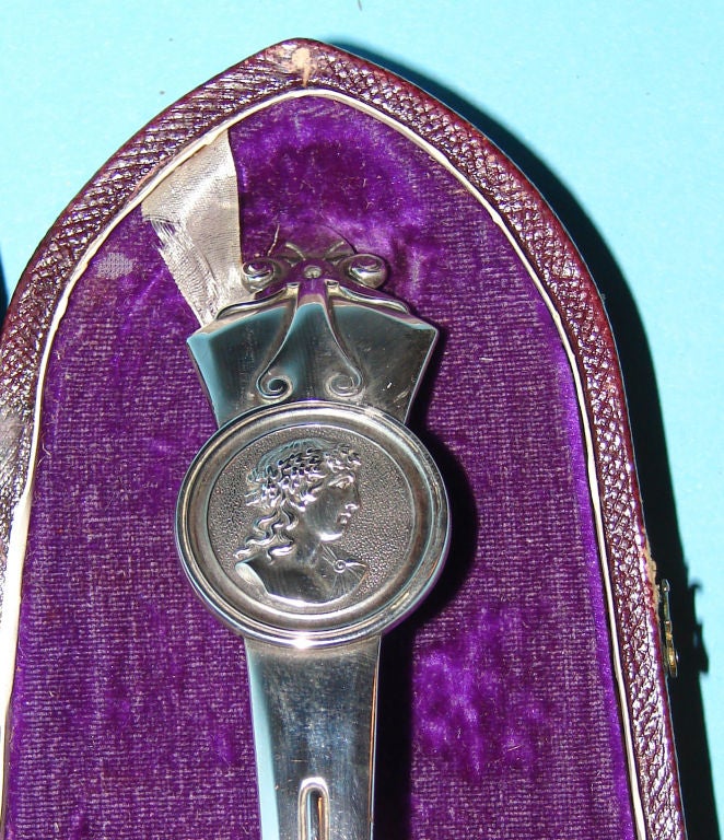 A Sterling silver punch ladle made by Gorham, circa 1870, Medallion pattern with gilt bowl, retaining its original case retailed by George Webb, Baltimore.