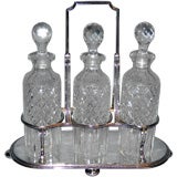English silver plated and cut glass tantalus
