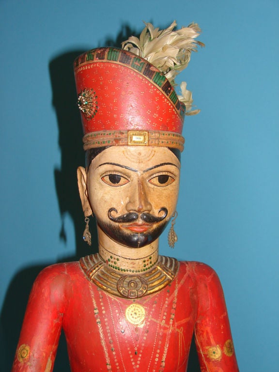 Pair of 19th Century carved Indian wooden figures.