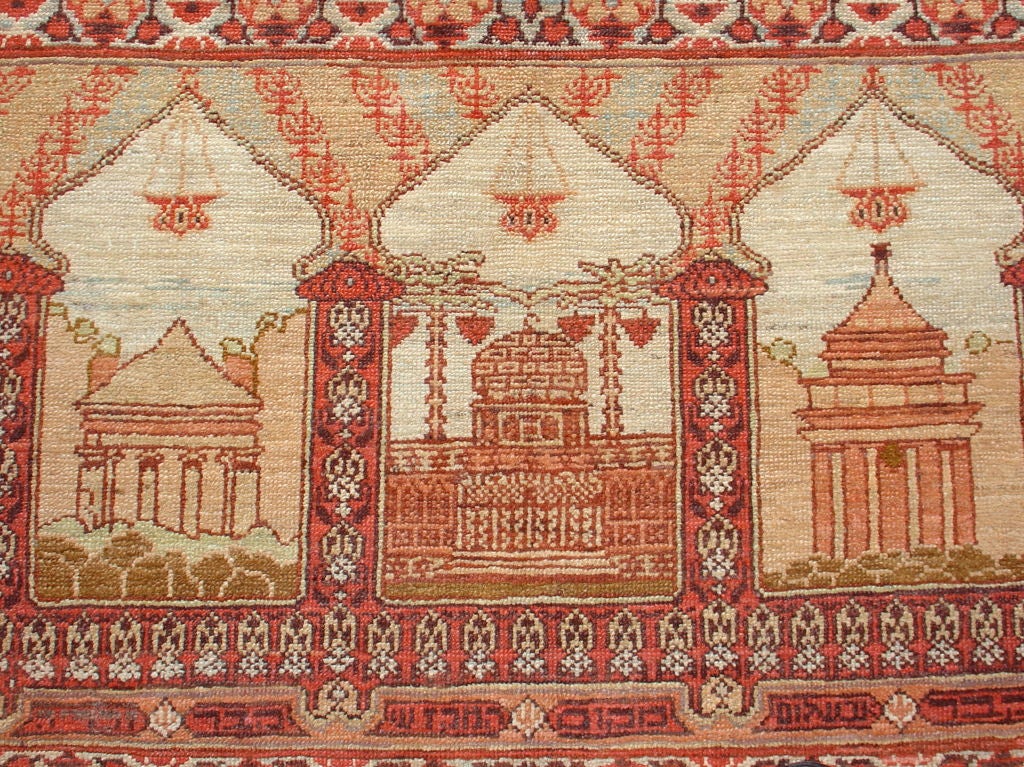 A rare item of woven Judaica, in lovely soft colors, depicting sites in Jerusalem.