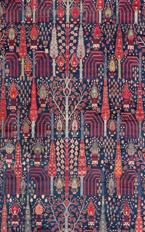 This large photo is only a detail of the carpet, which is complete with all of its borders.

A masterpiece of Persian weaving from the post-classical period, this dynamic quintessentially 18th century repeat design with willows, cypresses, and a