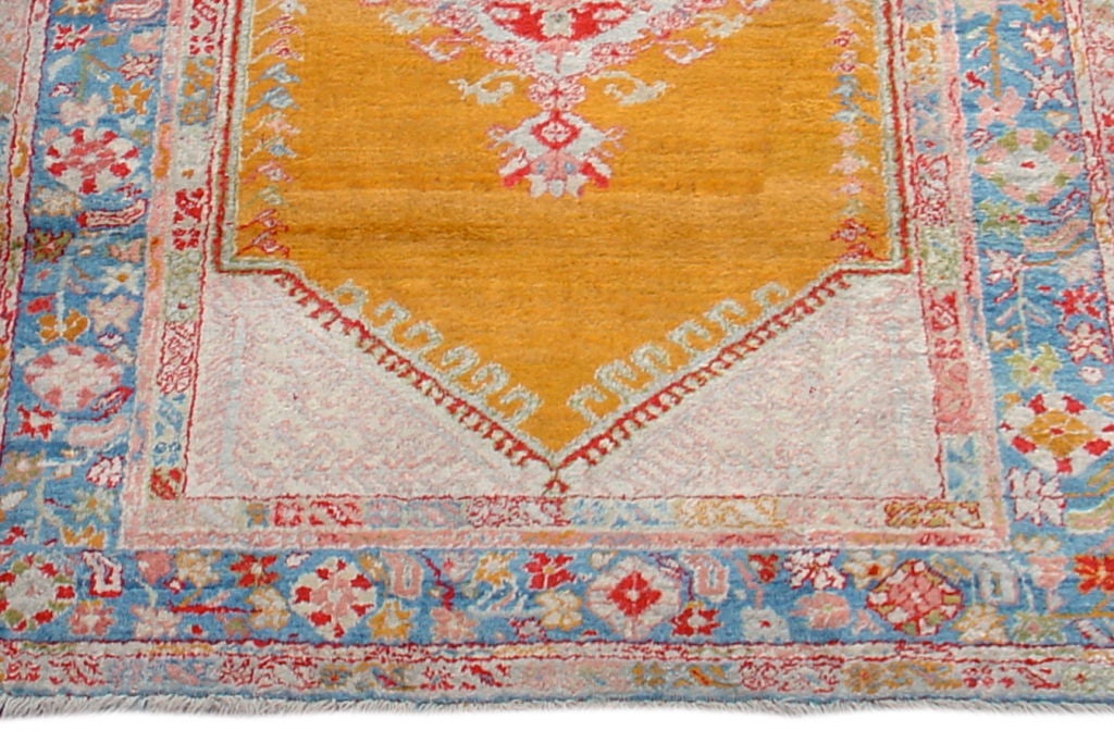 Antique Turkish Angora Oushak Rug with Saffron Yellow Field, Late 19th Century

A soft and glossy rug with a saffron yellow field which contrasts nicely with a soft blue border and a range of pastel tones.

Dimensions: 4'6