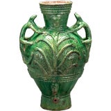 A Spanish Green Glazed Terra Cotta Jar