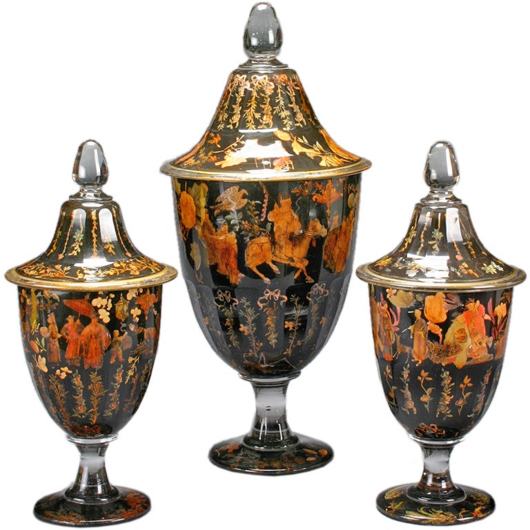 An English Garniture of 3 Decalcomania Vases With Covers.