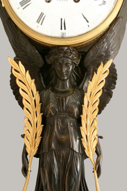 French An Empire Gilt and Patinated Bronze Nike Figure Wall Clock