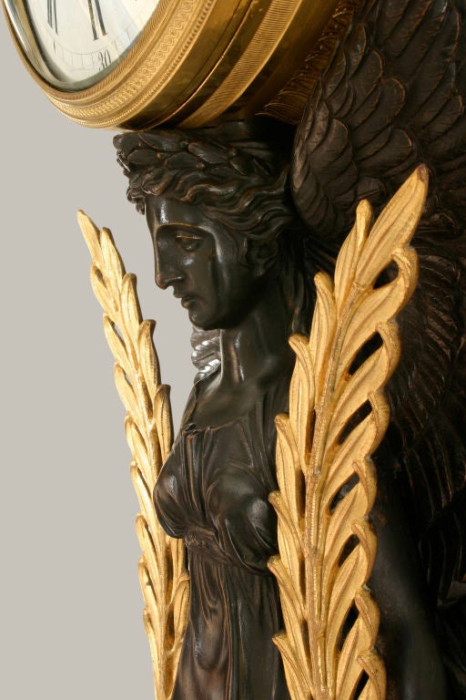 19th Century An Empire Gilt and Patinated Bronze Nike Figure Wall Clock