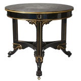 An English Ebonized Center Table by George Trollope & Sons