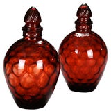 A Pair of Red Glass Decanters