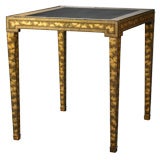 A Chinese Export Gilt and Black Lacquer Table