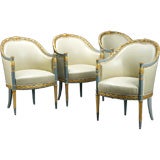 A Set of 4 French Art Deco Painted and parcel Gilt Armchairs