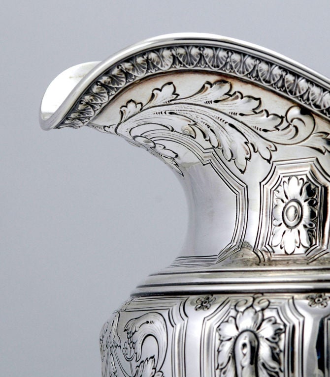 PLEASE VISIT LAUREN STANLEY<br />
<br />
Fine Circa 1927 sterling silver water pitcher in the Maintenon pattern by Gorham of Providence, RI, the vase form and base chased and repousse in a rococo motif, the handle and base similarly decorated. <br