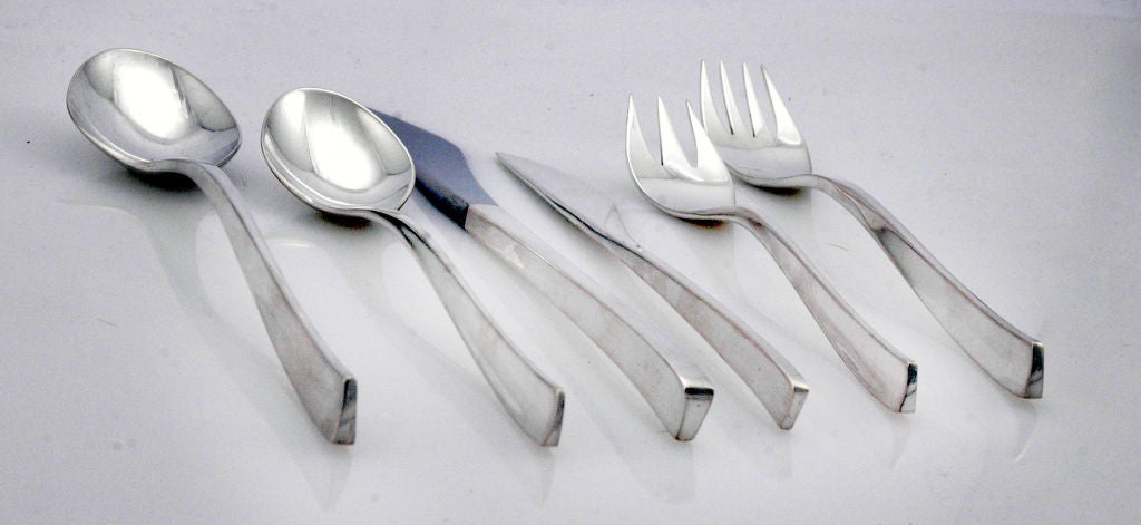 A fine vintage 1961 sterling silver flatware set by International Silver of Meriden, CT, in the highly collectible Vision pattern designed by Ronald Hayes Pearson, first introduced in 1961, shaped proud and pure for a skyward age. 

Jewel Stern in