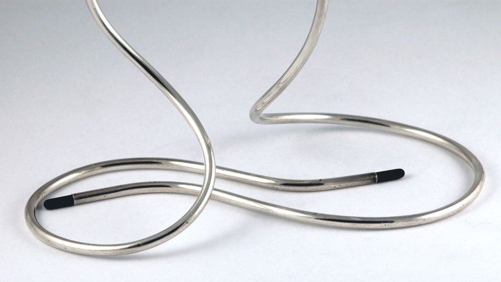 PLEASE VISIT LAUREN STANLEY<br />
<br />
A fine pair of circa 1957 sterling silver candlesticks designed by Marion Anderson Noyes for Towle of Newburyport, MS,in an organic modern design with black plastic tips. (These sticks are in the permanent
