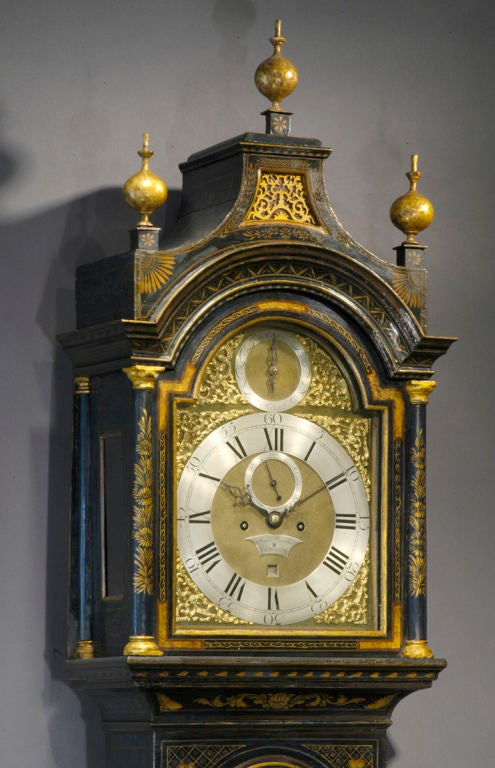 A rare George III blue lacquer longcase clock, signed Hugh Munshall, London,circa 1765, A very fine example of the “pagoda top” form of tall clock with exceptionally well preserved decoration in the rarest of colors, blue.