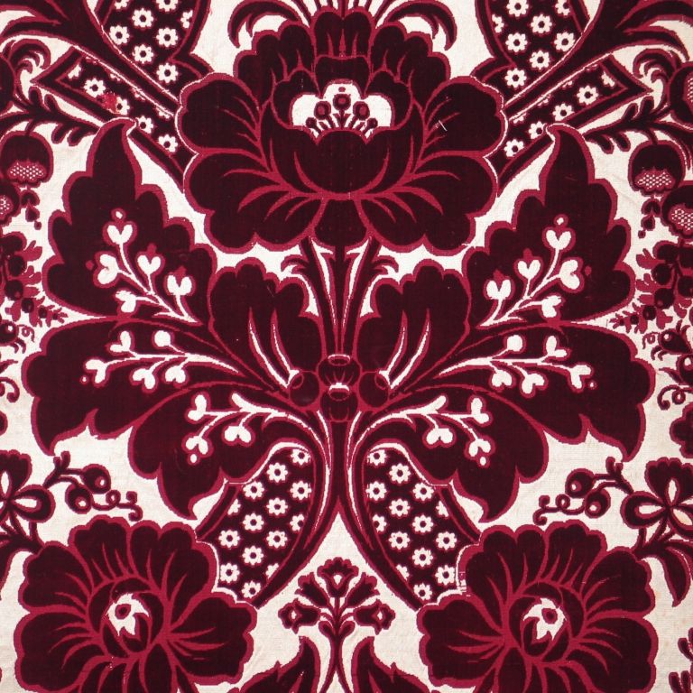 17th century Italian large patterned red silk velvet in a Renaissance foliated floral design with a gold back ground.