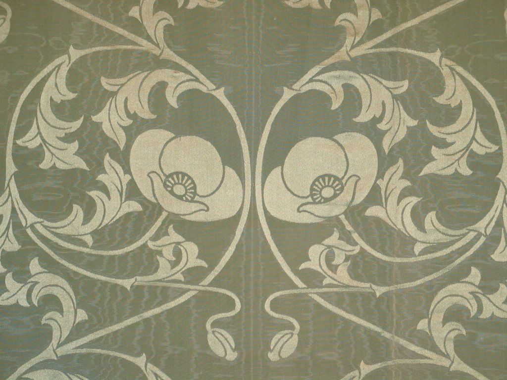 A very fine French Art Nouveau (1885-1914)celadon moire silk damask patterned with a repeated scrolling poppy flower.