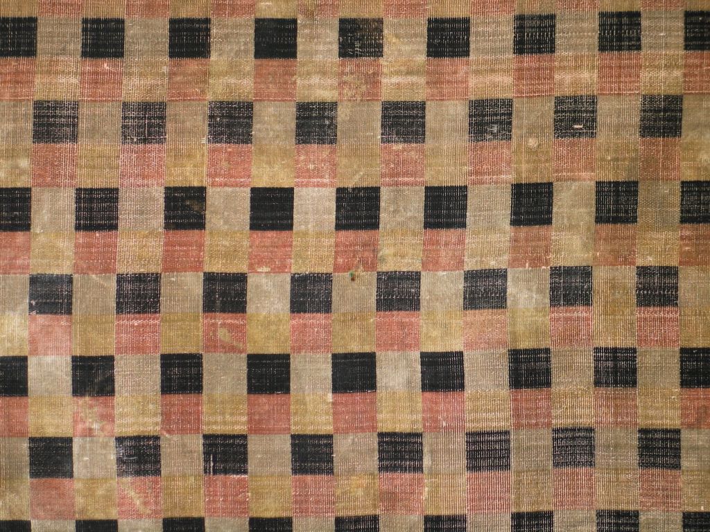 Chinese Ming dynasty (1368-1644) silk uncut velvet in four colors woven in squares:  black, taupe, yellow, and red (cochineal). (selvedge to selvedge)