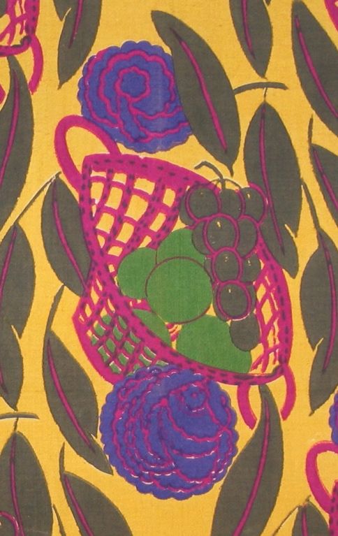 Early 20th century French printed cotton panel with a bright yellow ground with large purple roses, bright fuchsia colored baskets of  of bright green fruit surrounded by light black leaves.