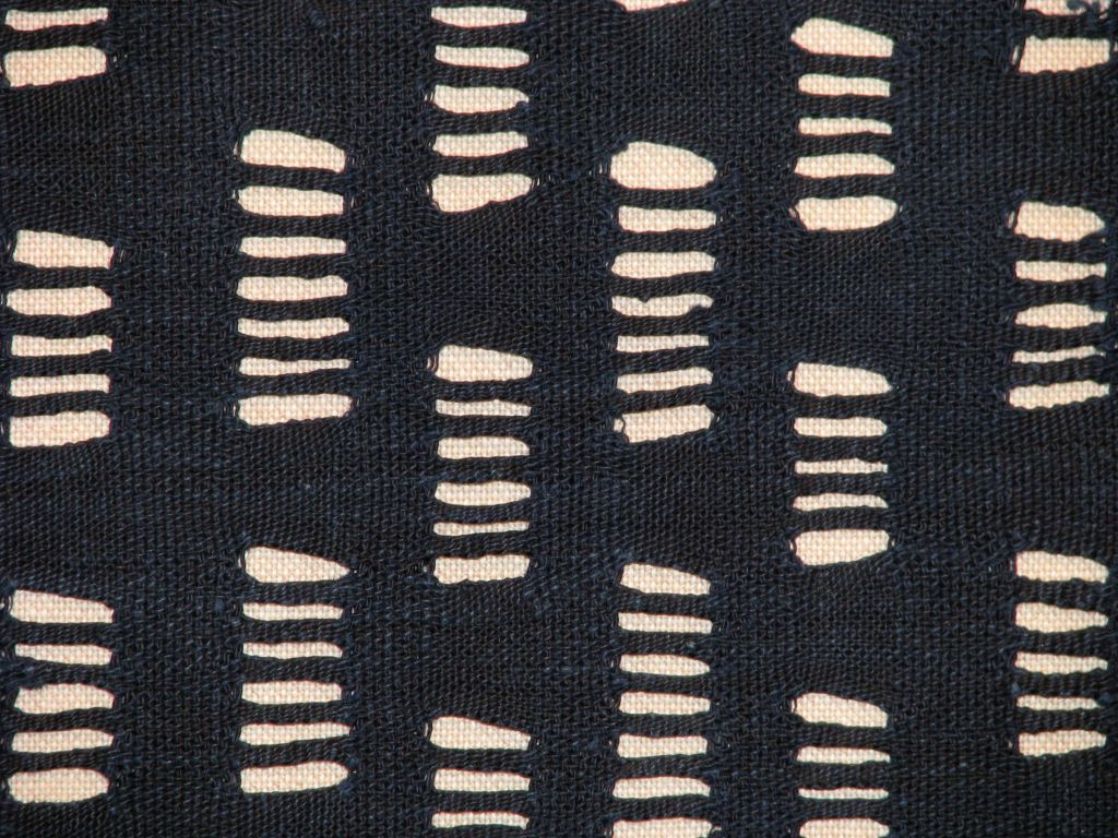 A rare cotton indigo shawl from Nigeria (Benin or Hausa) with open work design and fringe.