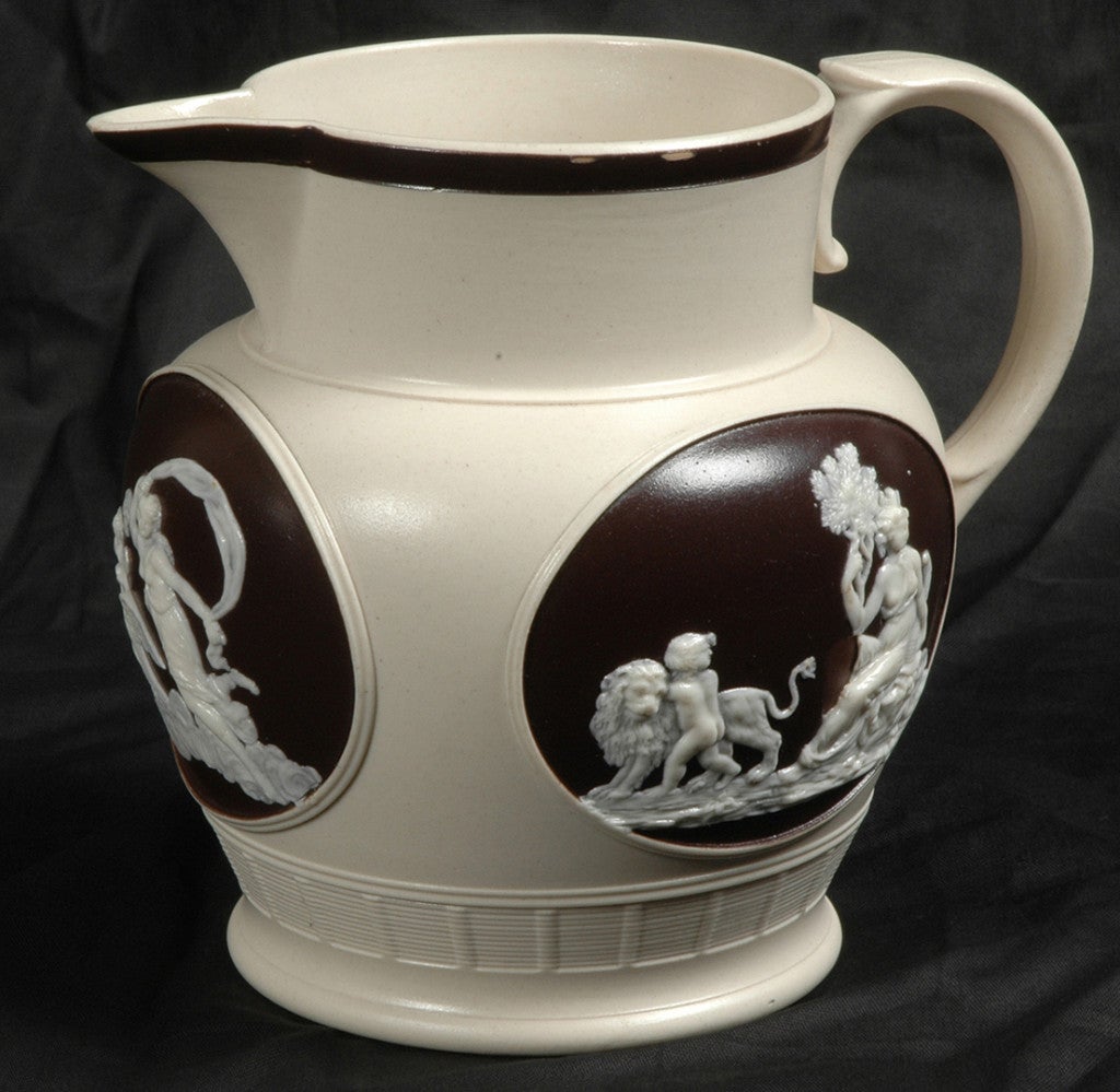 Smear glazed felspathic stone ware pitcher