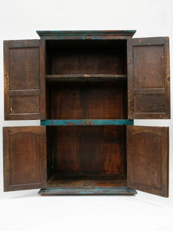 This three shelf armoire has a wonderful patina reflecting its many years of use in a country estate.