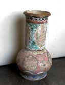 AGE HAS SOFTENED THE DEEP PAINT COLORS ON THIS MOROCCAN VASE GIVING IT WONDERFUL CHARACTER.