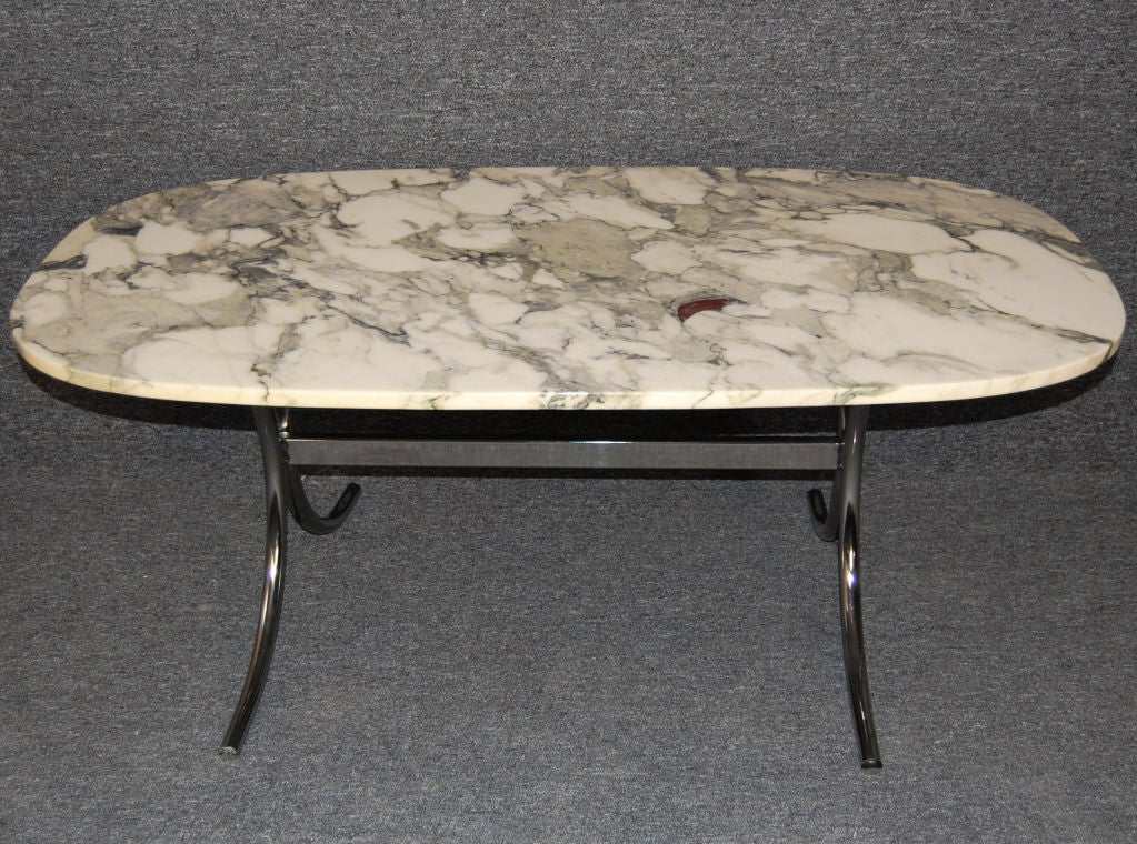 Gorgeous Danish coffee table of white Italian marble with deep grayish-green veins - with a small touch of deep red.  Tubular chrome base.