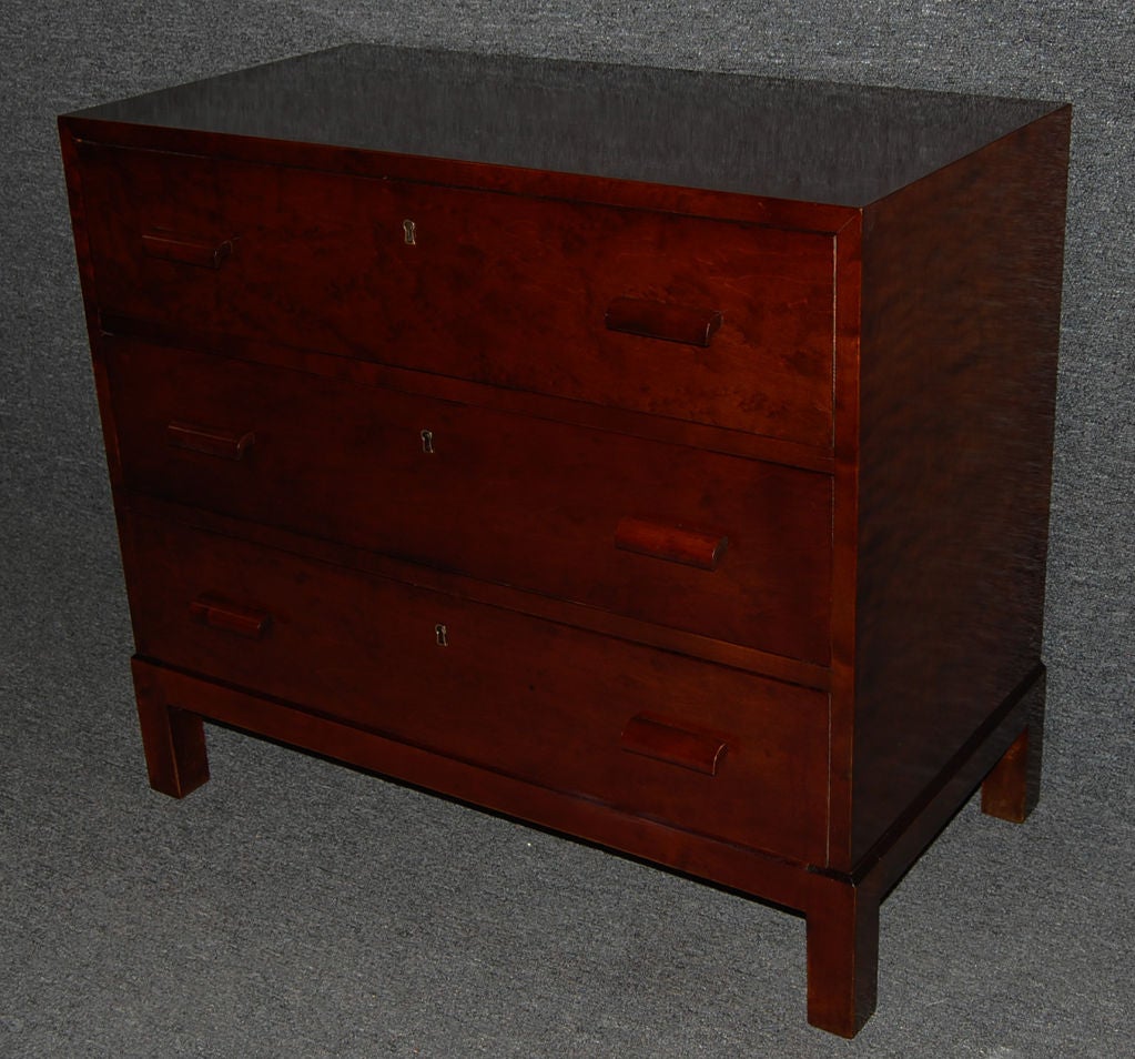 Beautiful Dark Flame Birch three drawer chest in the Art Deco style from Sweden. Chest of drawers has rounded drawer pulls. A lovely simple addition to any space! 

Key not included