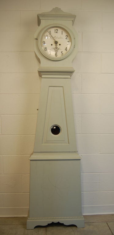 Beautiful Gustavian floor clock by C. Malmstrom.  Believed to be from the area of Malmo in Southern Sweden, this elegant clock is a soft painted dove gray.  

The paint is very old, but probably not original.  As these clocks were passed down from