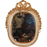 Very Fine Gilt Decorated 
Carved Oval Looking Glass