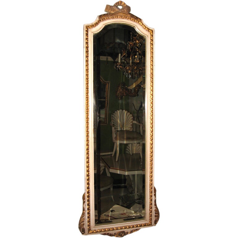 Pair of Crème and Parcel Gilt Mirrors with Double Arch For Sale