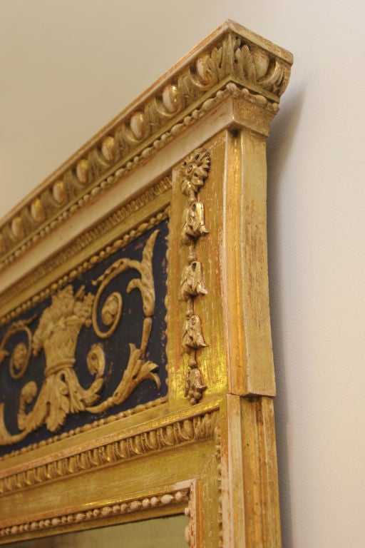 Giltwood and painted mirror
