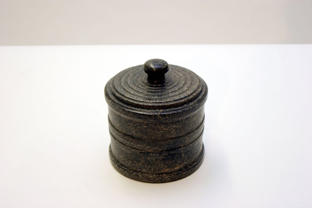 A Swedish Kolmards marble tobacco jar, of cylindrical form, Circa 1820, with a stepped lid for the top and inner tobacco press.