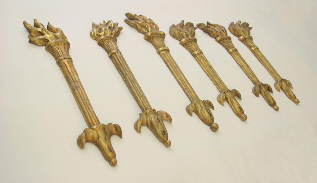 Six giltwood finials
