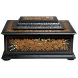 A mother-of pearl, marquetry-inlaid ebony and ebonized box