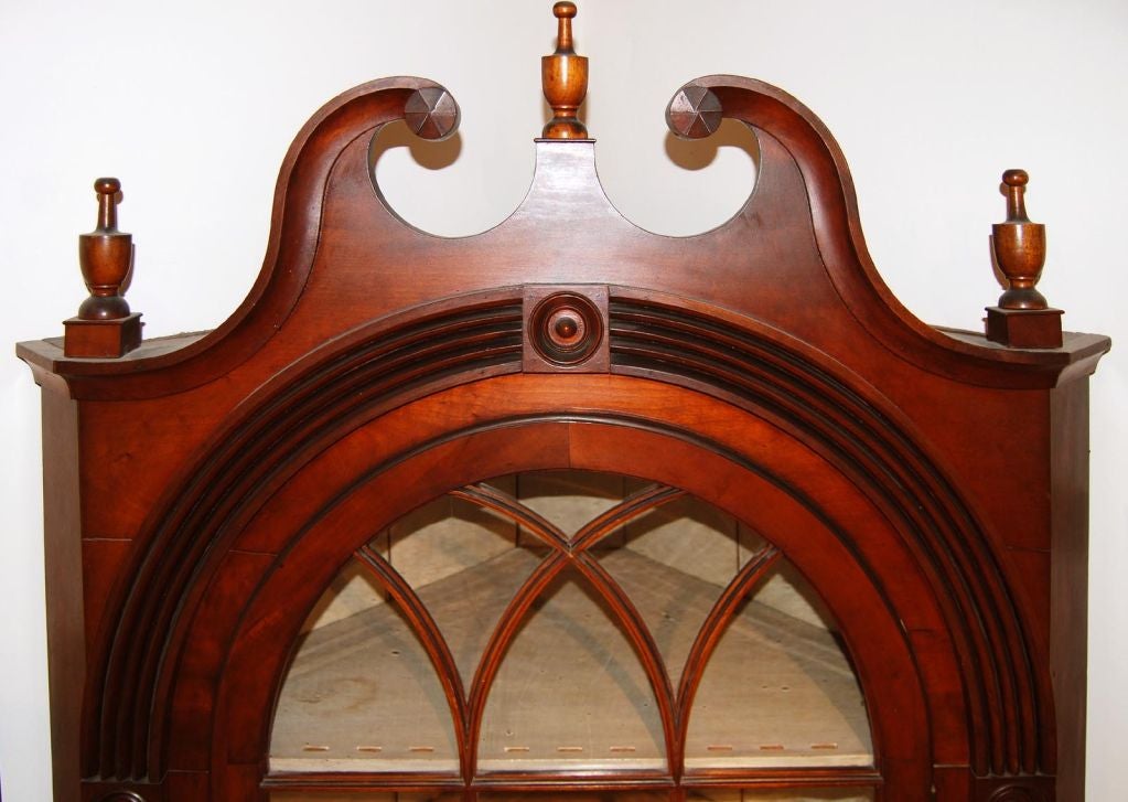 Fine federal corner cupboard from Pennsylvania, circa 1810. Worked in cherry wood with good detail, and original glass