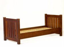 American White fumed oak in a beautiful quarter sawn grain. massive double ended head and foot boards in the same height. large through tenon and exposed large oak pegs, make this rare daybed a great sofa and or guest bed.This daybed/sofa looks