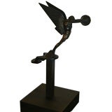 Winged automotive inspired figure