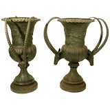 Monumental pair of bronze garden urns