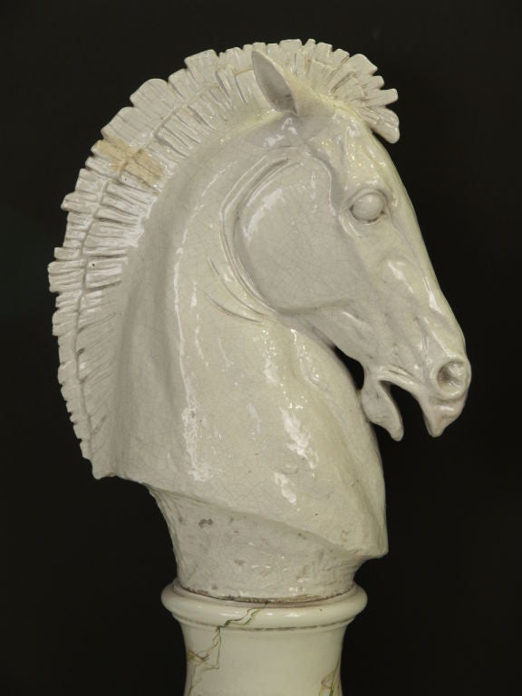 Monumental pair of glazed terracotta Cheval figures