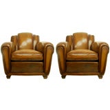 A Pair of Art Deco leather club chairs.  Circa 1930