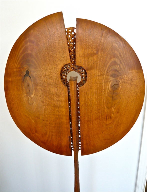 Shaped and latticed section of black walnut mounted on laminate base.California artist Doug Ayers is featured in 