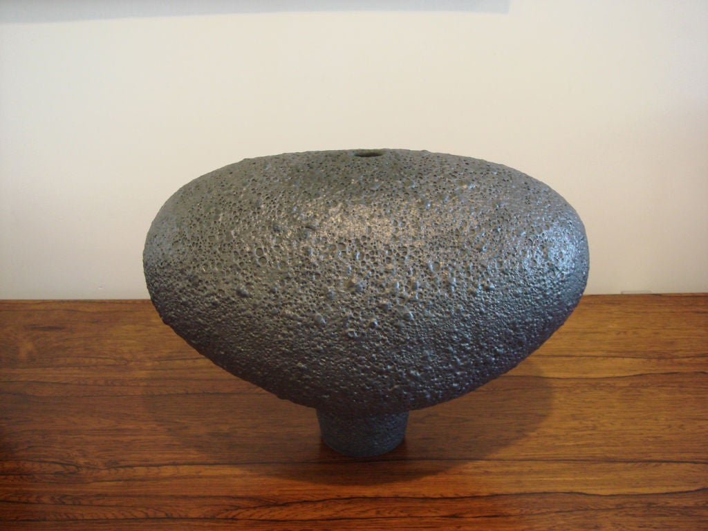 This California Zen ceramic piece can be placed on a pedestal or used as a centerpiece. The interplay of form and surface invites contemplation.