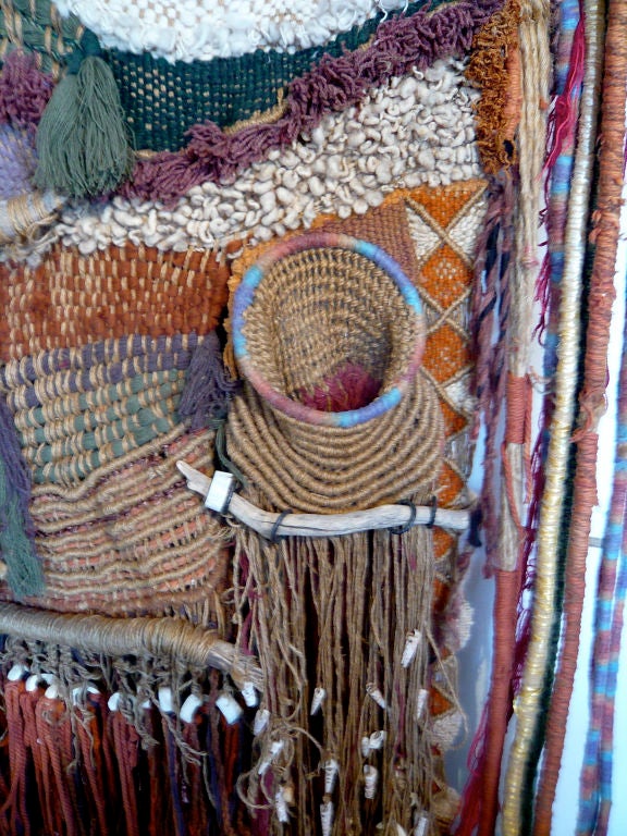 Stunning wall hanging by San Diego artist,Edith Zimmer, created in the 60's. Intricately woven with a mixture of hand dyed wool and found objects.