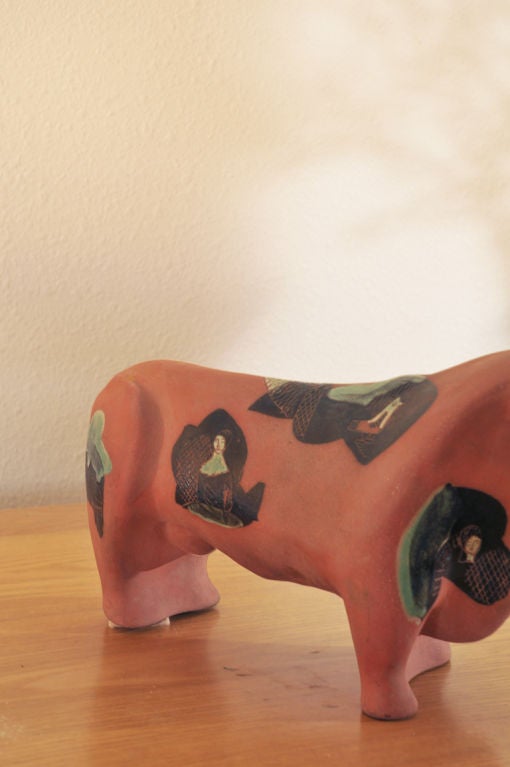 Ceramic Bull  by  internationally acclaimed  artist:  Marianna Von Allesch (German born).  This terra cotta bull is highlighted by color and texture and then glazed, making this bull strong and powerful. Signed by the artist in the terra cotta on