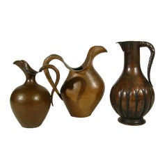 Retro GROUPING OF ITALIAN HAMMERED BRASS PITCHERS by Egidio Casagrande