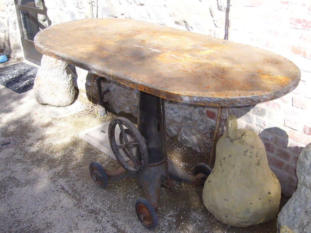 Oval Riveted Iron Table For Sale 1